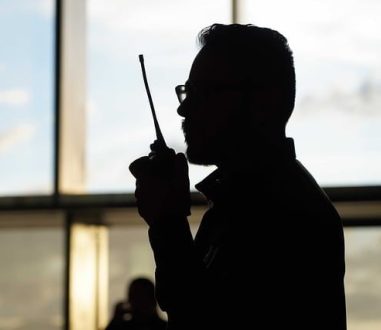 nepalese security guard communicating